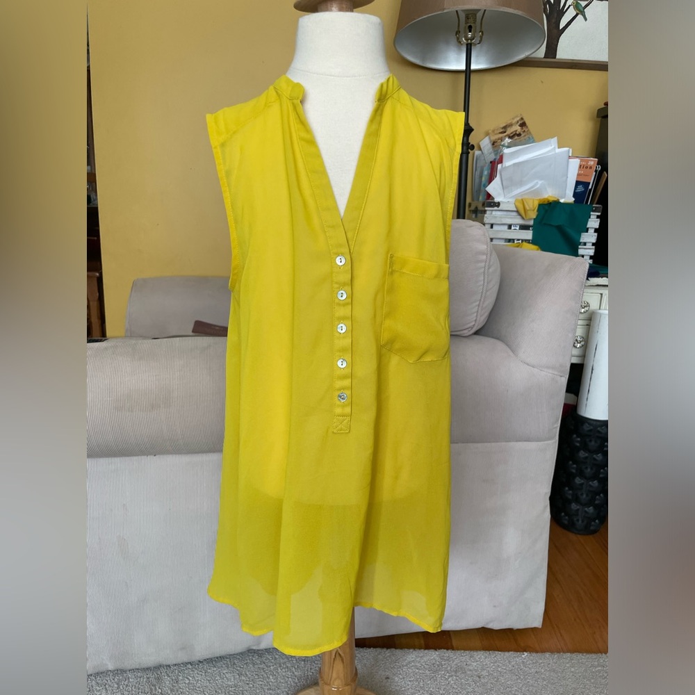 Sheer yellow sleeveless blouse